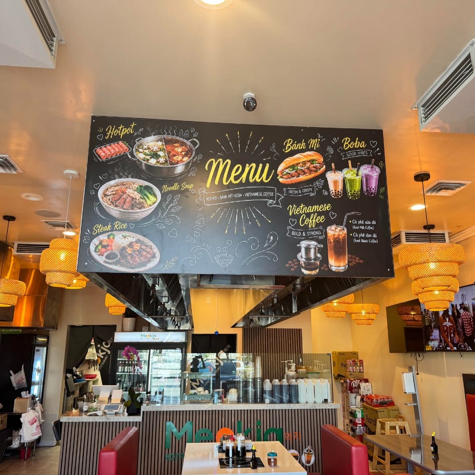 Menu artwork above Meokja's dining room.